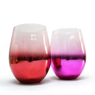 egg shaped red colored and plated decorative blown glass fragrance candle jar
