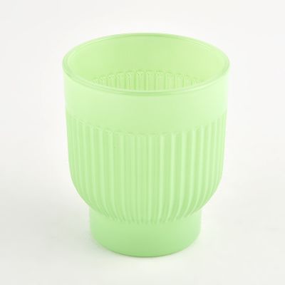 Round bottom vertical glass candle jar with home decor