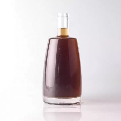Manufacture 500ml Flat Shouldered Round Clear Glass Bottles for Whisky Brandy Spirits