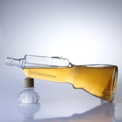Best Selling Liquor 500ml Whisky Glass Bottle Gun Shape Open Mold 700ml Vodka Bottle Manufacturer