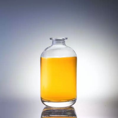 Factory Wholesale Price Transparent Small Round Vodka Glass Bottle 500ml 700ml Super Flint Glass High Quality Vodka Glass Bottle