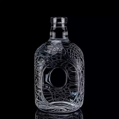 Factory Wholesale Hot Sale Round Carved 700ml 750ml Glass Bottle High Quality Super Flint Glass Vodka Glass Bottle Wine Bottle