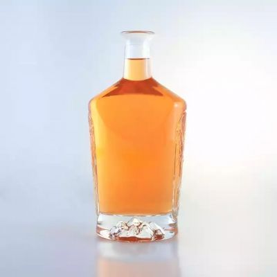 China Manufacturer 700ml 750ml Brandy Bottle Cork Finish Logo Embossed 70cl 100cl Round Glass Bottle