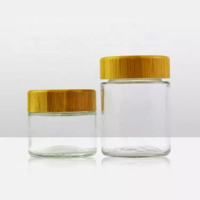 2oz 4oz child resistant glass jar with bamboo lid bamboo container clear bottle for raw flower package