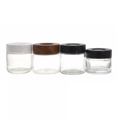 Wholesale Food Grade Dry Flower Stash Container 3.5g 2oz 3oz 4oz 5oz Custom Logo Printing Big Eye Magnifier Bottles Glass Jars