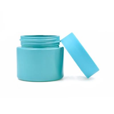 Wholesale 2 oz blue round herb flower jar glass bottle container with childproof lid