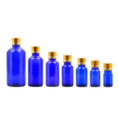 Hot sell 5ml 10ml 15ml 20ml 30ml 50ml 100ml empty blue essential oil glass bottle with screw lid
