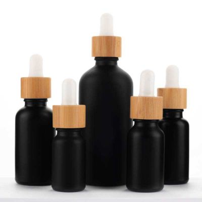 Wholesale Beard Oil Bottle Matte Black Euro Essential Oil Glass Dropper Bottle with Bamboo Dropper