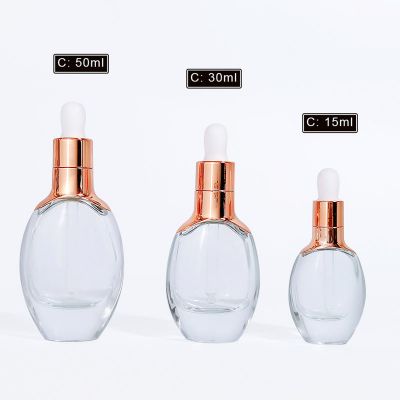 Custom Serum Essence Essential Oil Bottle Flat Oval Luxury Facial Glass Dropper Skincare Bottles 15ml 30ml 50ml with Plug