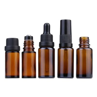 Free sample 10ml 15ml flat shoulder amber round shape essential oil glass dropper bottle with black screw lid