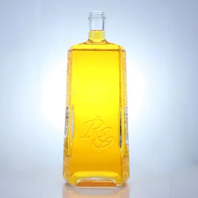 700ml 750ml flat shaped super clear embossed whiskey rum vodka spirits glass bottle with cork cap