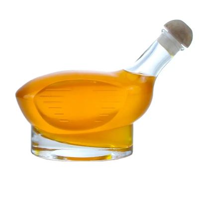Custom logo embossed glass bottle 500ml vodka tequila liquor glass bottle with cork cap