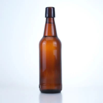 Guaranteed quality 500ml round amber color vodka beer bottle glass with cork cap