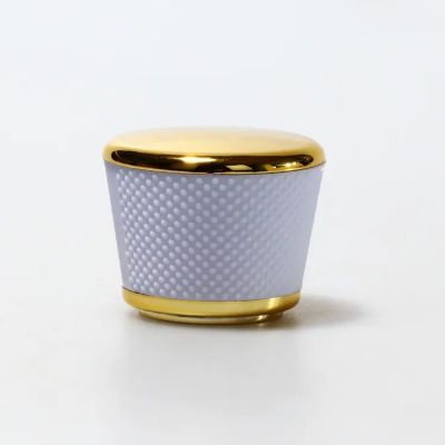 Custom logo zamac High Quality irregular cylinder perfume cap Metallic texture plastic ABS perfume lid