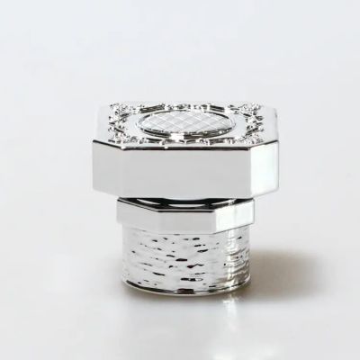 Custom logo zamac High Quality irregular cylinder perfume cap Metallic texture plastic ABS perfume lid