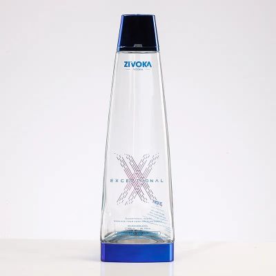 Hot sale spirit liquor clear empty 750ml vodka whisky glass bottle triangle shaped with lid cap engraved customize label decals