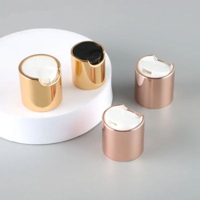 Good Quality Supplier Aluminum Twist Top Cap Top Button Plastic Bottle Cap Shampoo Customized Disc Top Cap For Bottle