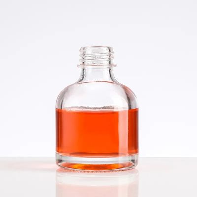 Transparent cylindrical 100ml glass bottle concave bottom transparent white wine bottle with screw cap