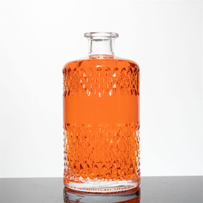 Factory Wholesale 500ml 700ml 750ml Custom Embossed Engraving Bourbon Whiskey Vodka Gin Glass Bottle with Custom Logo