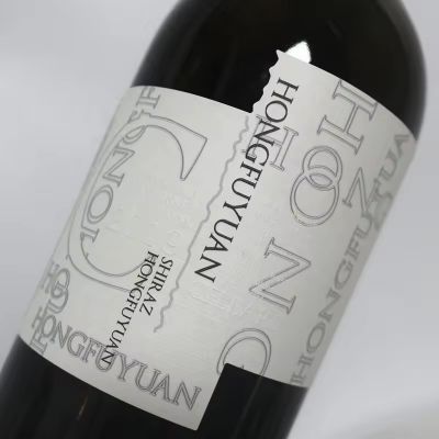 custom self adhesive textured paper embossed wine label roll sticker for bottle packaging
