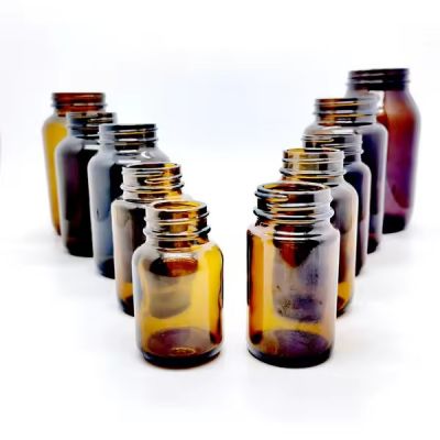 China Supplier 60ml 75ml 100ml 120ml Amber Wide Mouth Lightproof Pill Amber Glass Capsule Bottle With Screw Lid