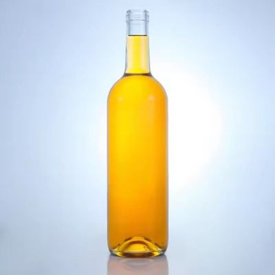 Hot Selling round shape clear 750ml whisky liquor rum vodka glass bottle with rising bottom