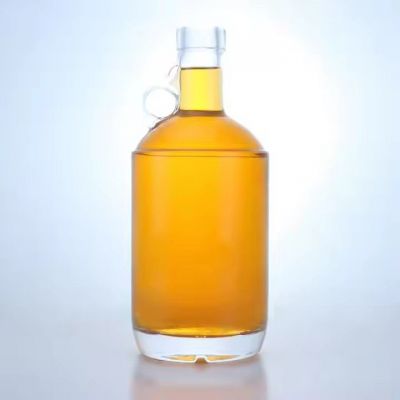 Clear glass bottle 750ml round shaped glass bottle cork top liquor spirits vodka gin glass bottle with handle