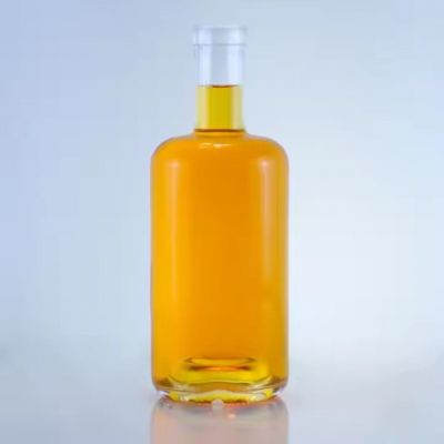Preferential 700ml liquor brandy tequila vodka glass bottles alcohol glass bottle round shaped glass bottle with cork top