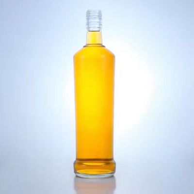 China factory 700ml round shaped glass bottle Ultra-thin bottom whisky gin tequila transparent glass bottle with screw cap