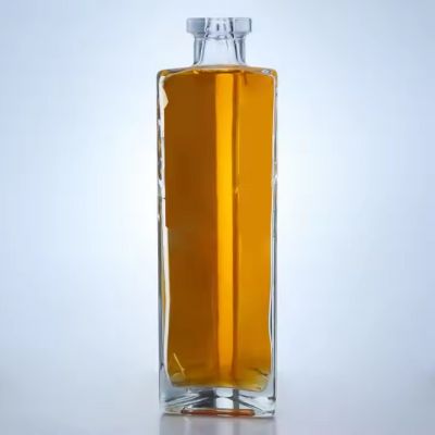 2023 Latest Exquisite Design Triangular Rum Glass Bottle 750ml Hot Selling Liqueur Glass Bottle With Corks