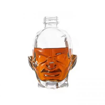 factory wholesale 750ml whiskey glass empty bottles skull shape glass liquor bottle with plastic screw cap