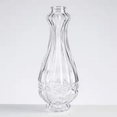 custom concave depression at the base vodka brandy whisky tequila bottle 500 ml 700 ml 750 ml cork Screw cap Plastic cap Glass