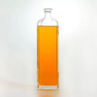 China Hot Selling Whiskey Shape Clear High Quality 700ml750ml Brandy Vodka Unique Design Shape Vodka Glass Bottle With Cork
