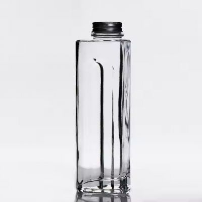 Factory Custom 520ml Unique Triangular clear Glass Bottle with Aluminum Cap