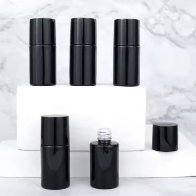 Fancy Wholesale Small Custom Cosmetic Packaging and Printing 7ml Black Empty Luxury Cylinder Nail Polish Glass Bottles