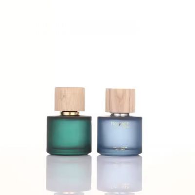 Wholesale New 30ml 50ml 100ml Round Frosted Clear Glass Perfume Bottle With Wooden Cap