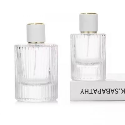 Factory Supply Cosmetic Packaging Luxury Cylinder Shape Stripe Pattern Clear 30ml 50ml 100ml Glass Perfume Bottle with Cap