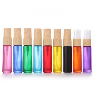 Thick Bottom Cylinder Shape 10ml Mini Empty Frosted Colored Refillable Glass Spray Perfume Bottles With Wood Grain Plastic Pump