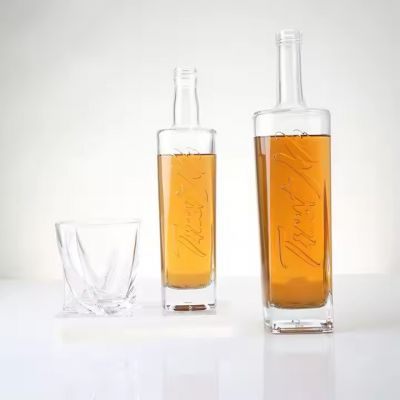 Wholesale Unique 500ml 750ml Glass Whisky Liquor Spirit Bottle Slope Shoulder for Liquor Whiskey Rum With Lids