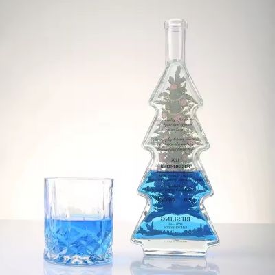 Wholesale Hot Selling 300ml Christmas Tree Shaped Glass Diffuser Bottle with Cork for Wine Liquor Beverage Glass Empty Bottle