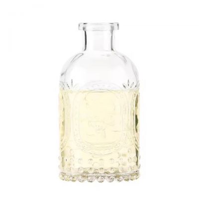 Round Shape 100ml Exquisite Embossed Perfume Bottle Reed Diffuser Glass Bottle for Home and Hotel Aromatherapy