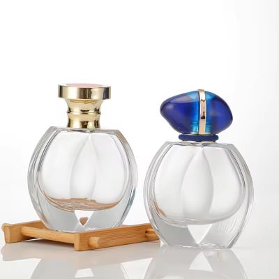 Modern Design Luxury Crystal Irregular Essence Bottle 30ml Clear Transparent Glass Cosmetic Bottle With High-End Lid