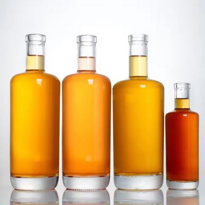 Recyclable Round Empty Flint Glass Bottle with Spray Cap for Liquor Wine Tequila Brandy Energy Drinks Cork Sealing Included